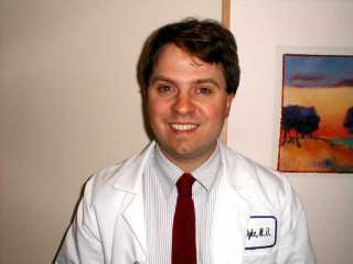 Photo of Dr. Van Dyke in his white coat